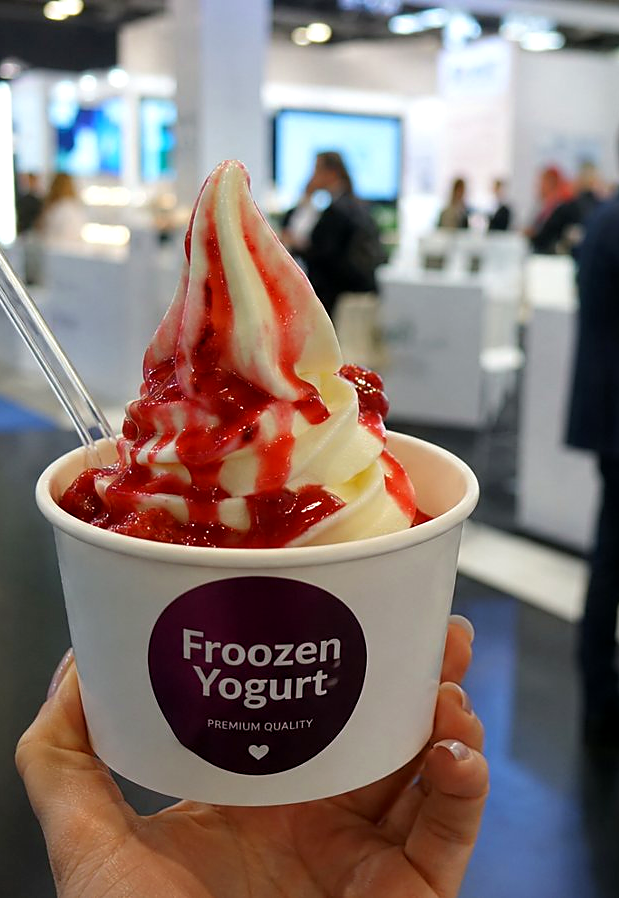 Frozen yogurt catering trade fair – cup with toppings